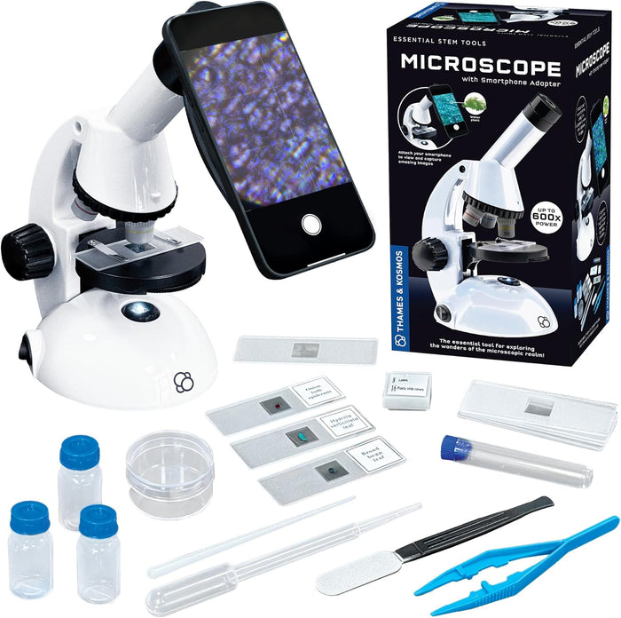 Microscope set with smartphone adapter, samples, and tools on a white background