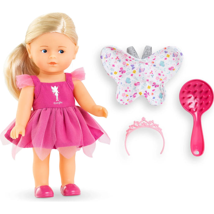 Doll with pink dress, butterfly, headband, and brush on a white background