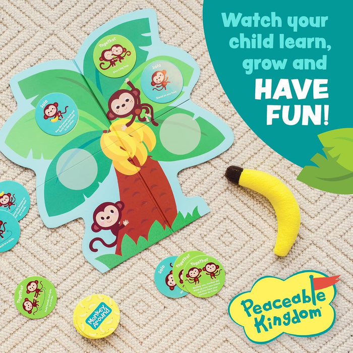 Educational children's toy with monkey and banana design, featuring the Peaceable Kingdom brand.
