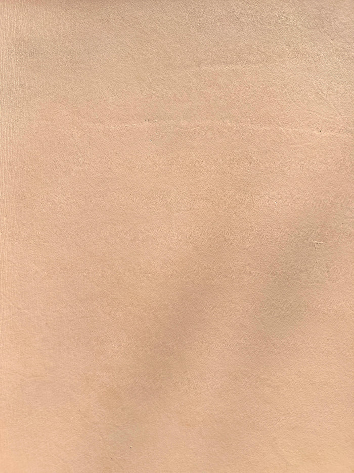 Natural Veg-Tan Tooling Cowhide detail view showing color and natural variation