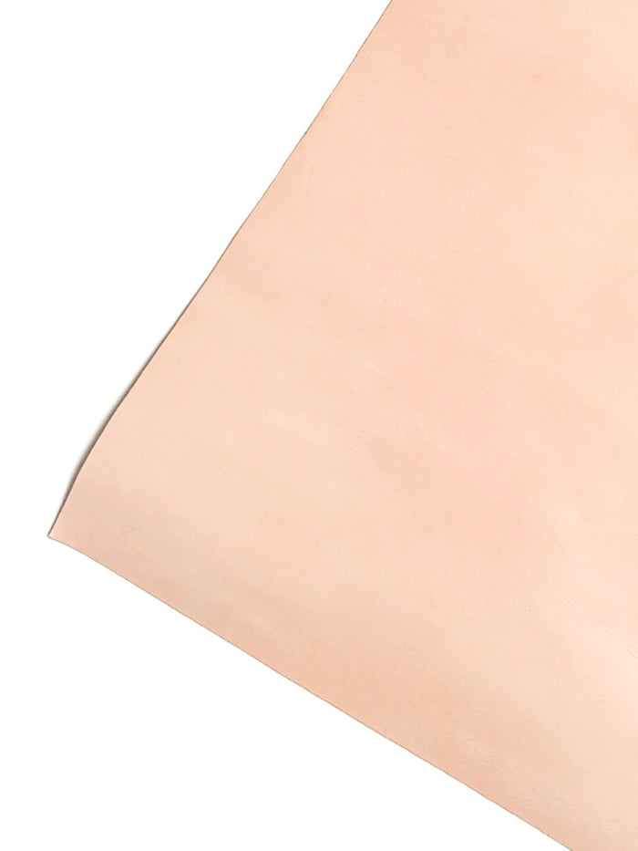 Natural Veg Tan Tooling Cowhide sheet showing raw undyed color