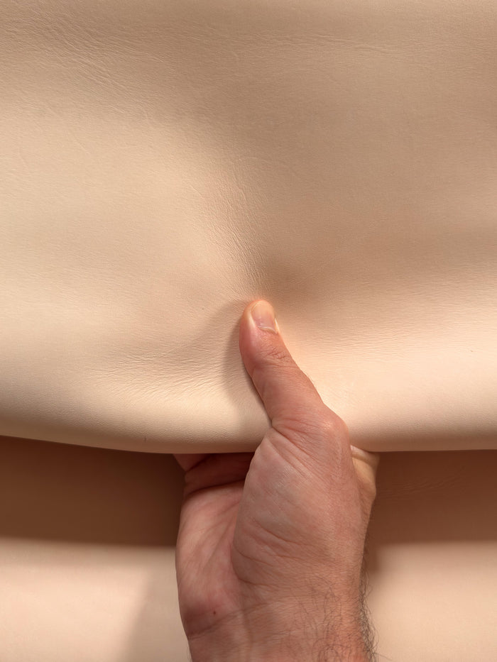 Close-up of Natural Veg Tan Tooling Cowhide grain and firm temper
