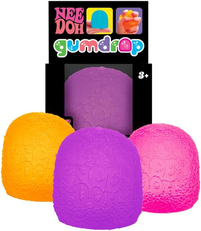 Three colorful gumdrop-shaped toys with packaging labeled 'Nee Doh' on a white background.