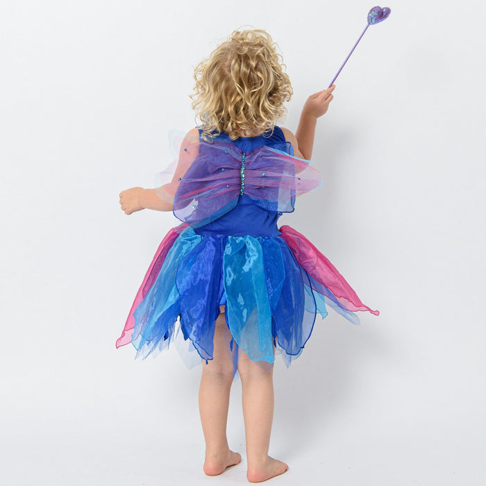girl playing in blue fairy dress