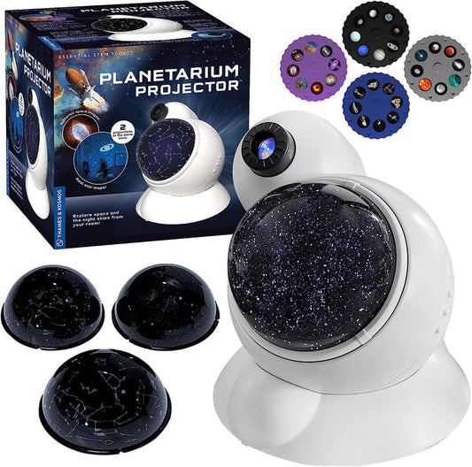 Planetarium projector with packaging and celestial wheel accessories on a white background
