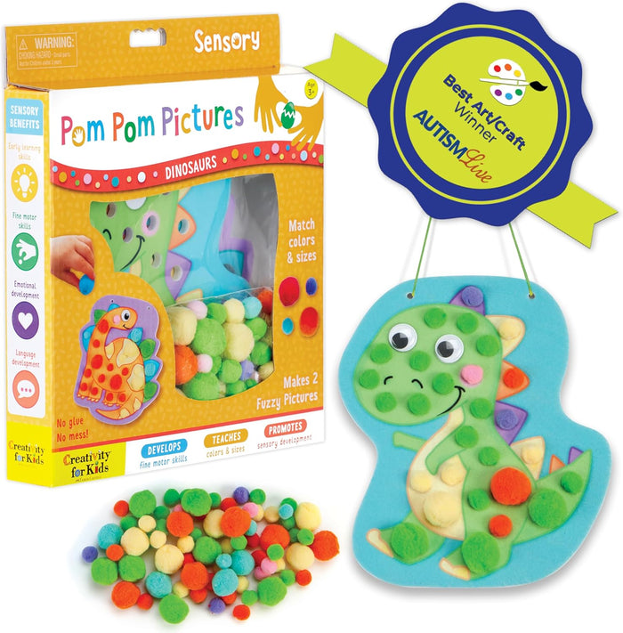 Pom Pom Pictures dinosaur craft kit with colorful pom-poms and a completed dinosaur picture, featuring Autism Alliance award.