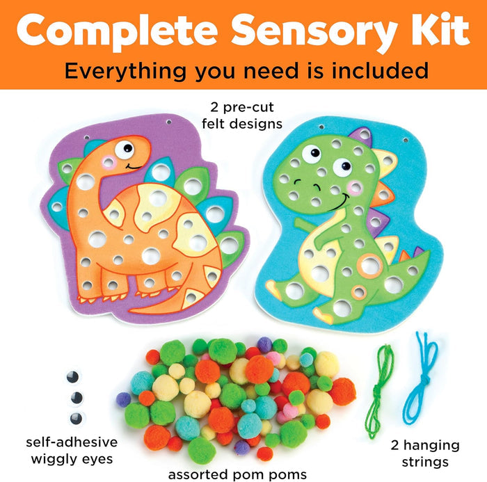 Complete sensory kit with dinosaur designs, pom poms, and strings on a white background.