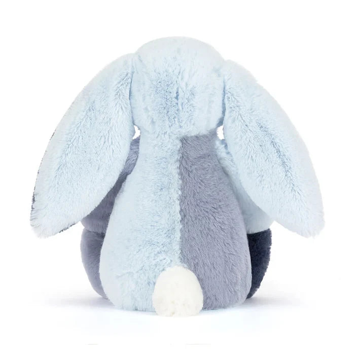 Plush toy rabbit with light blue and gray colors on a white background