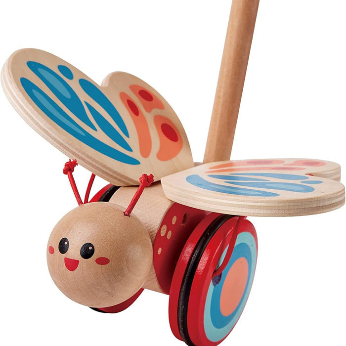 Wooden toy butterfly push toy with colorful wings on a white background