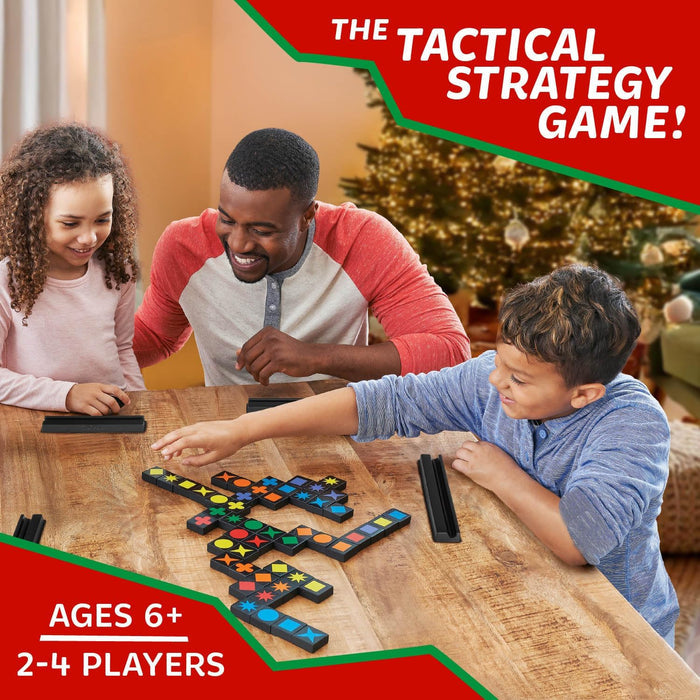 Family playing Qwirkle together with Christmas decorations in the background