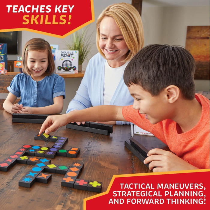 Woman and two children playing Qwirkle on a table.