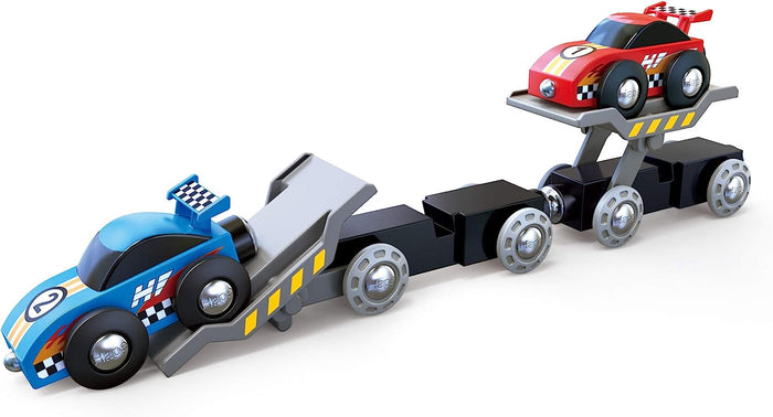 Blue race car driving off the train bed while the red race car sits loaded on a second train bed