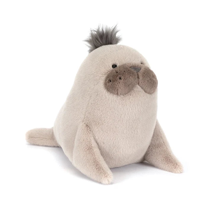 Plush toy seal on a white background