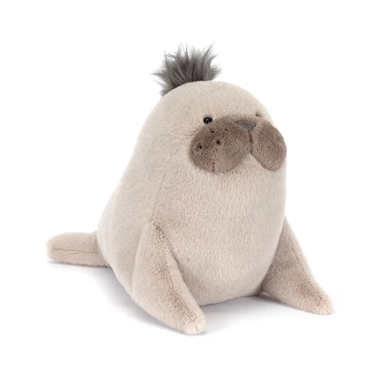 Plush toy seal on a white background
