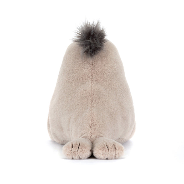 Plush toy with a fluffy tail on a white background