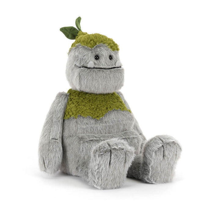 Seated Rockleton Jellycat on a white background