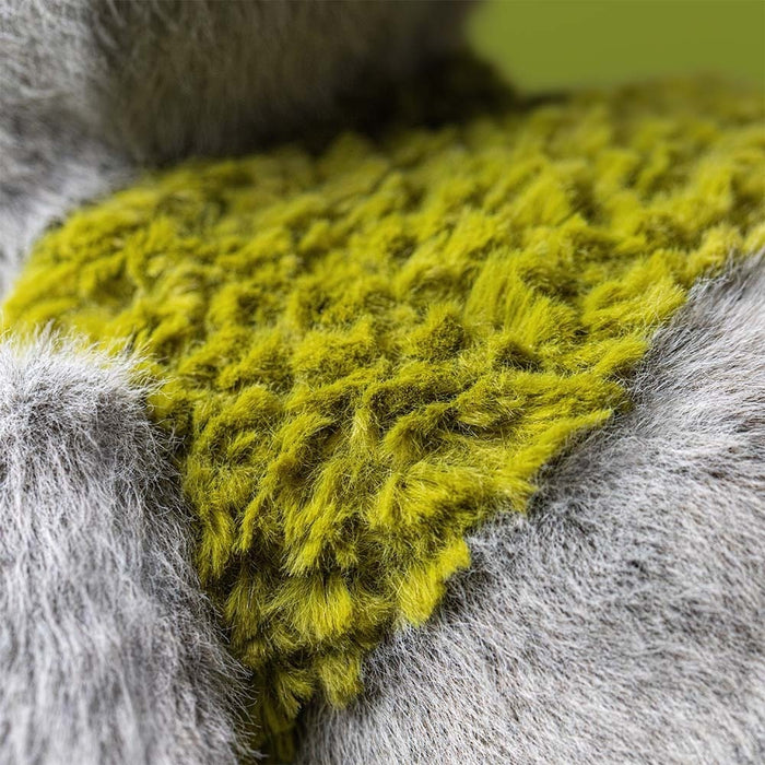 Close up of fuzzy green and grey fabric from Rockleton's body