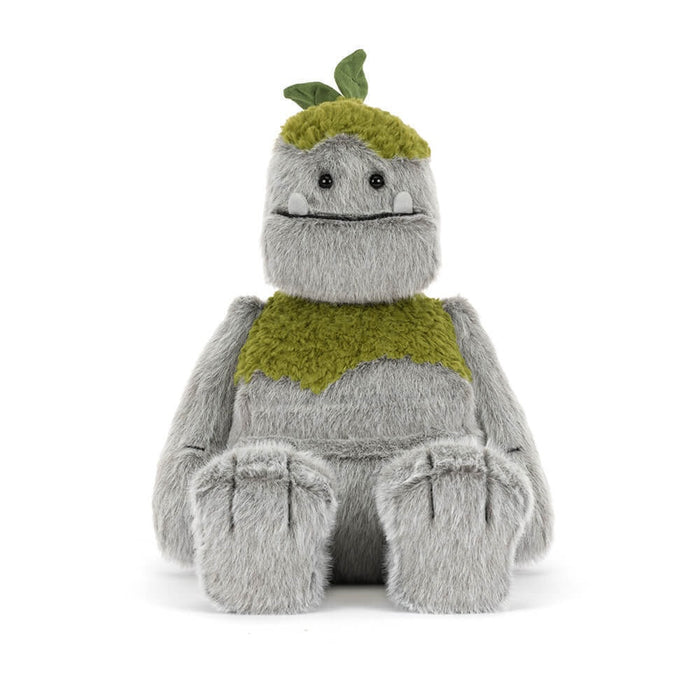 Seated Rockleton Jellycat on a white background