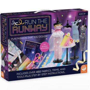 Box for 'Run the Runway' fashion design kit with mannequins, fabrics, and tools on a white background.
