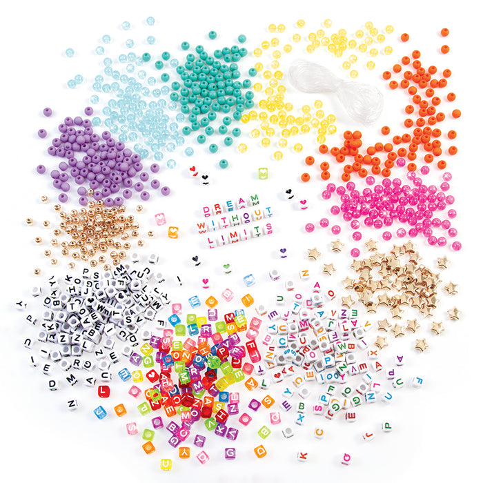 Assorted colorful beads and letters on a white background