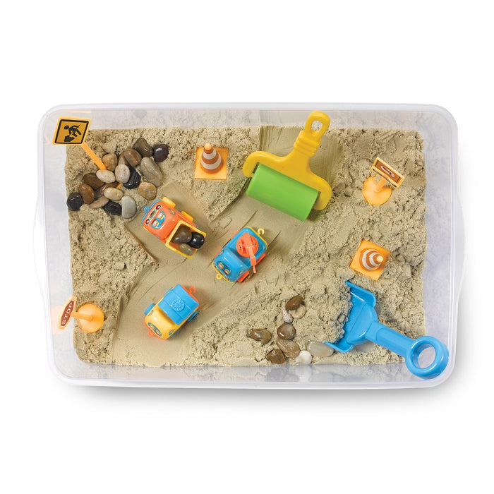Contents of a construction theme Sensory Bin on a white background