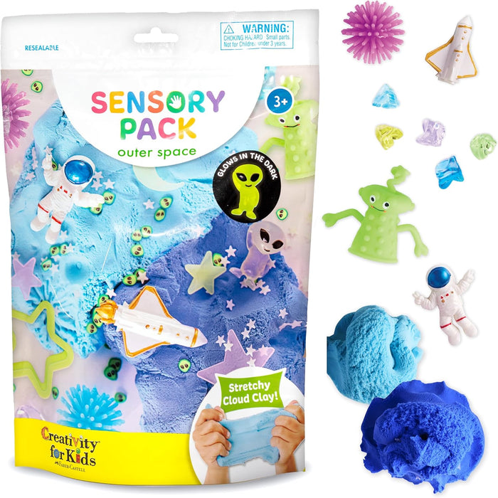 Sensory pack for children with space-themed items and blue stretchy cloud clay.