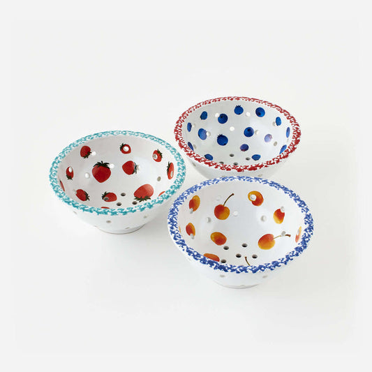 Set of 3 Assorted Berry Bowls with hand-painted fruit designs in various colors and perforated for draining.