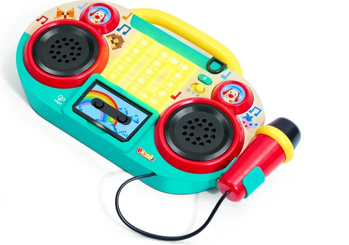 Colorful toy boombox with microphone on a white background