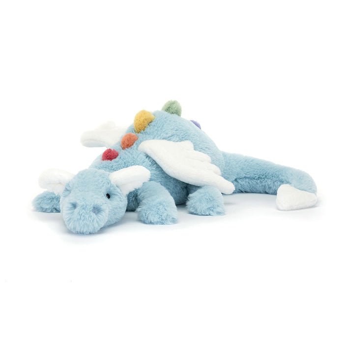Blue plush dragon toy with colorful accents on a white background