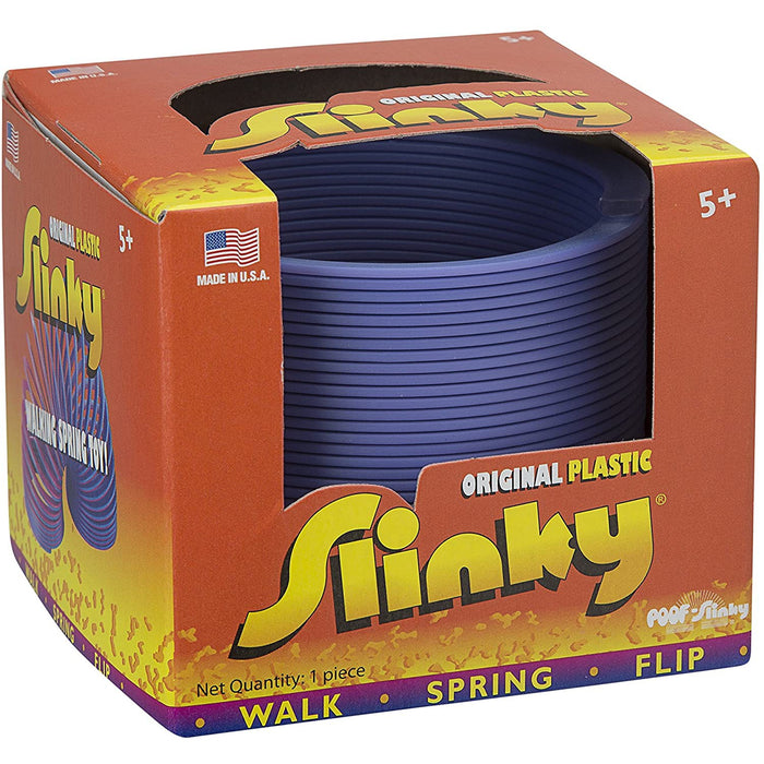 Plastic Slinky in a box on a white background
