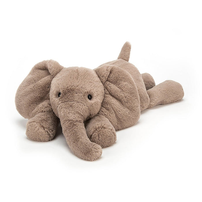 Super cuddly grey elephant with black eyes.