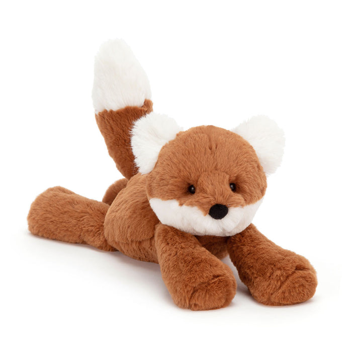 Plush toy fox on a white background