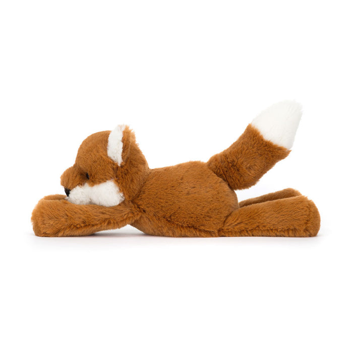 Side view of a plush fox toy on a white background