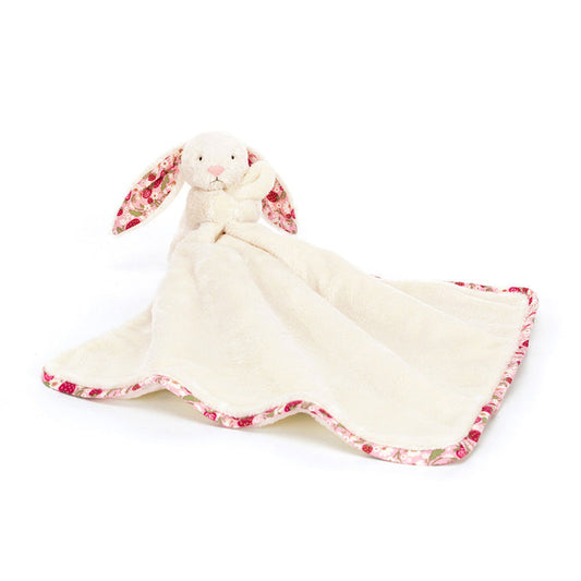 Floral-patterned bunny-shaped comfort blanket on a white background