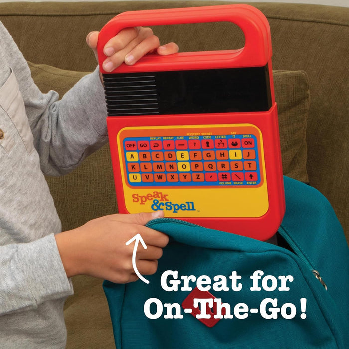 Speak & Spell device held by a person with text 'Great for On-The-Go!' on a couch background.