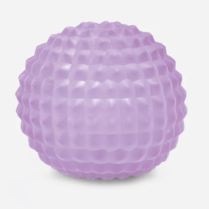 A textured purple Gump Scale, dimpled, bubbly surface, shown on a clean white background.