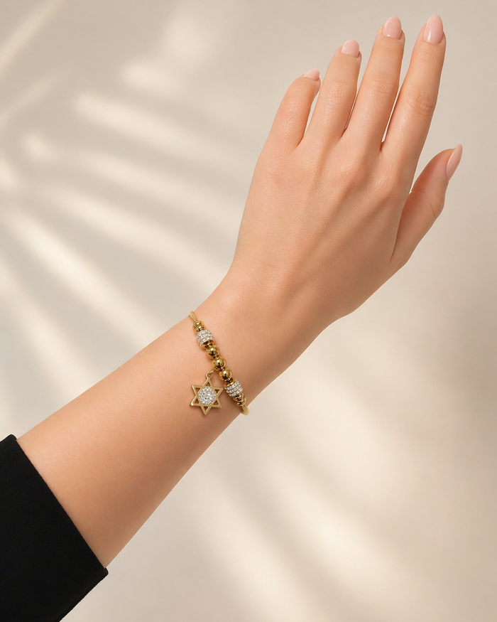 star of david gold bracelet stainless steel worn on wrist lifestyle view