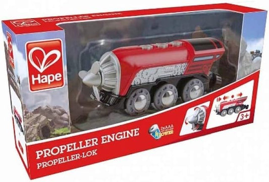 Hape toy propeller engine in its packaging with mountain landscape illustration