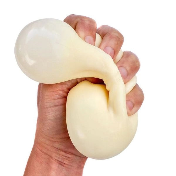 Hand holding a stress ball against a white background