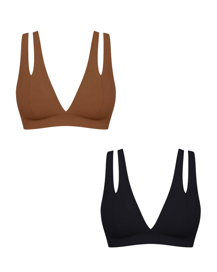 Two wireless triangle bralettes with double shoulder straps, shown on a plain white background. One in a warm brown, the other in black.