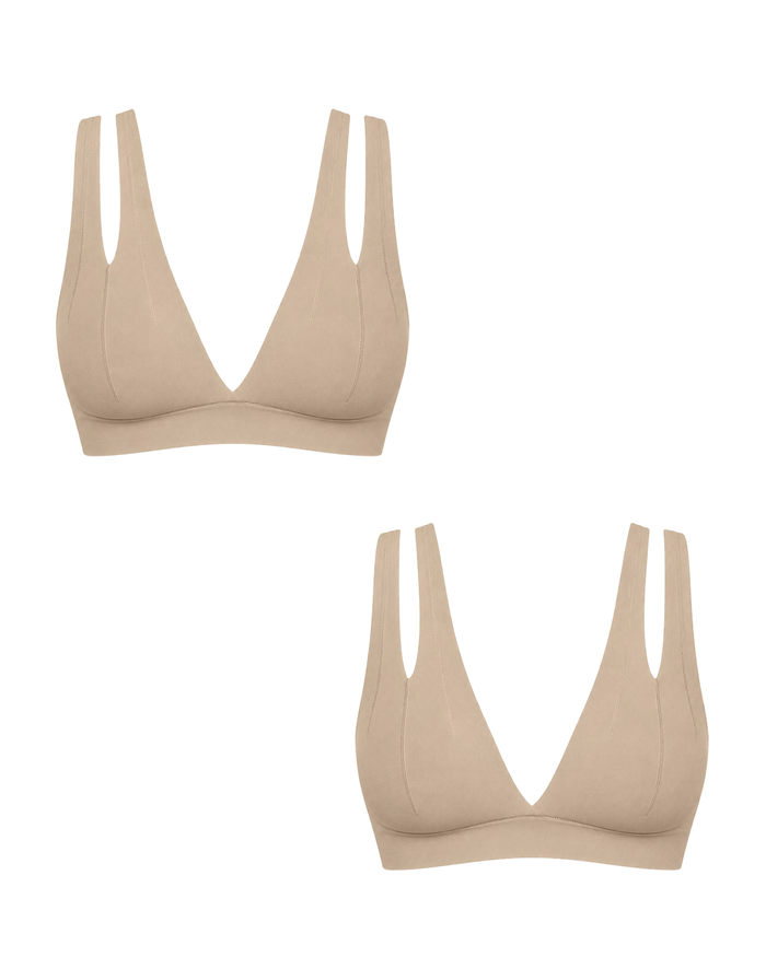 Two beige wireless triangle bralettes with double shoulder straps, shown on a plain white background.