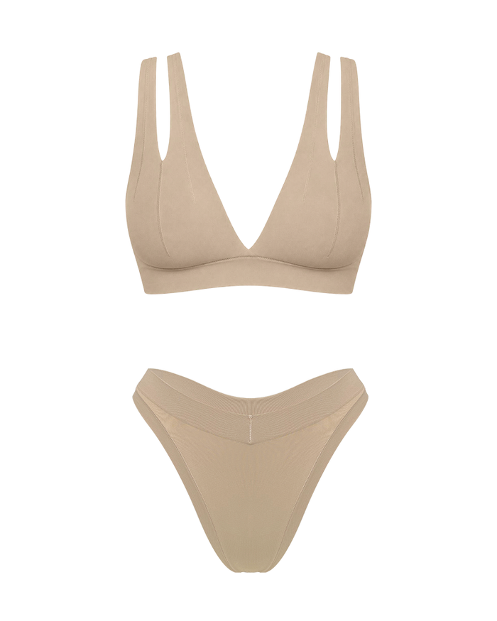 Matching two piece beige underwear set, bra with v plunge and double shoulder strap detail.