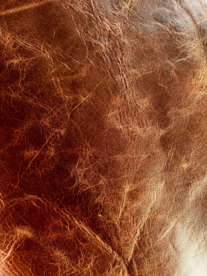 Terracotta Pull-Up Cowhide detail view showing color and natural variation