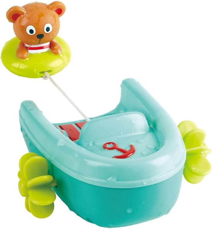 Toy boat with a bear character on a white background