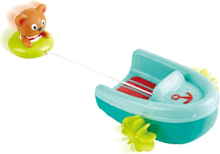 Toy boat with a bear character on a white background