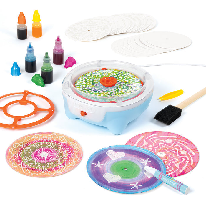 Ultimate Spin Art on a white background, including a small blue and white spinning base, five ink bottles, and completed spin art disks with various designs.