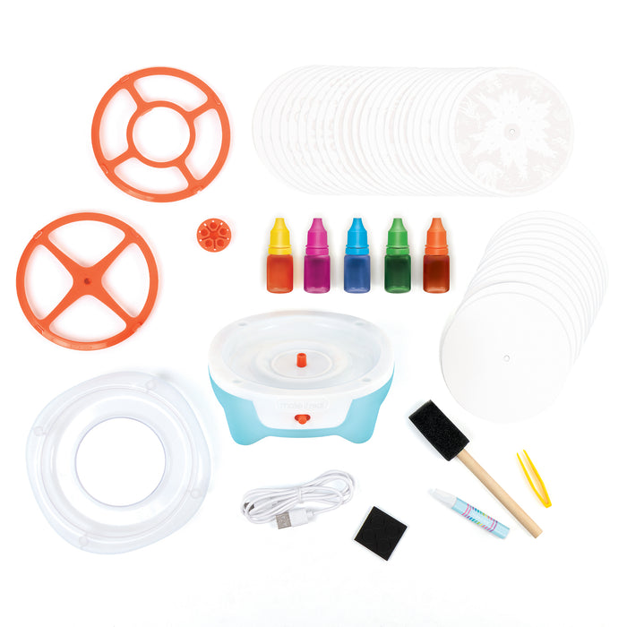 Ultimate Spin Art contents laid out on a white background, including a small blue and white spinning base, orange circular molds, white circular discs, several small bottles of colorful liquid, a USB cable, a sponge, tweezers, and other small accessories.