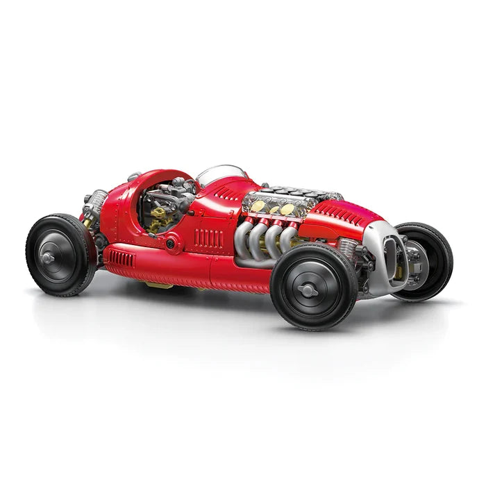 Red vintage-style toy car on a white background