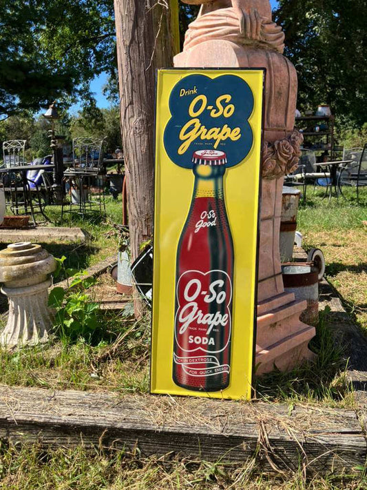 Vintage-Style "Drink O-So Grape Soda" Advertising Sign showcasing classic retro graphics and vibrant colors.