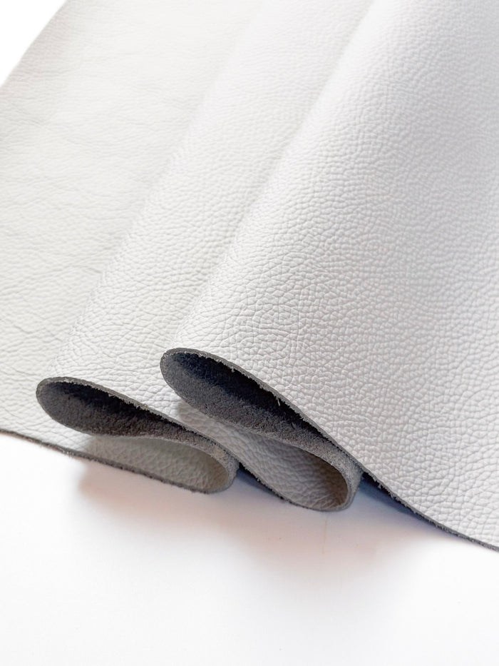 White Upholstery Cowhide, 12 × 24 in close view showing grain and texture